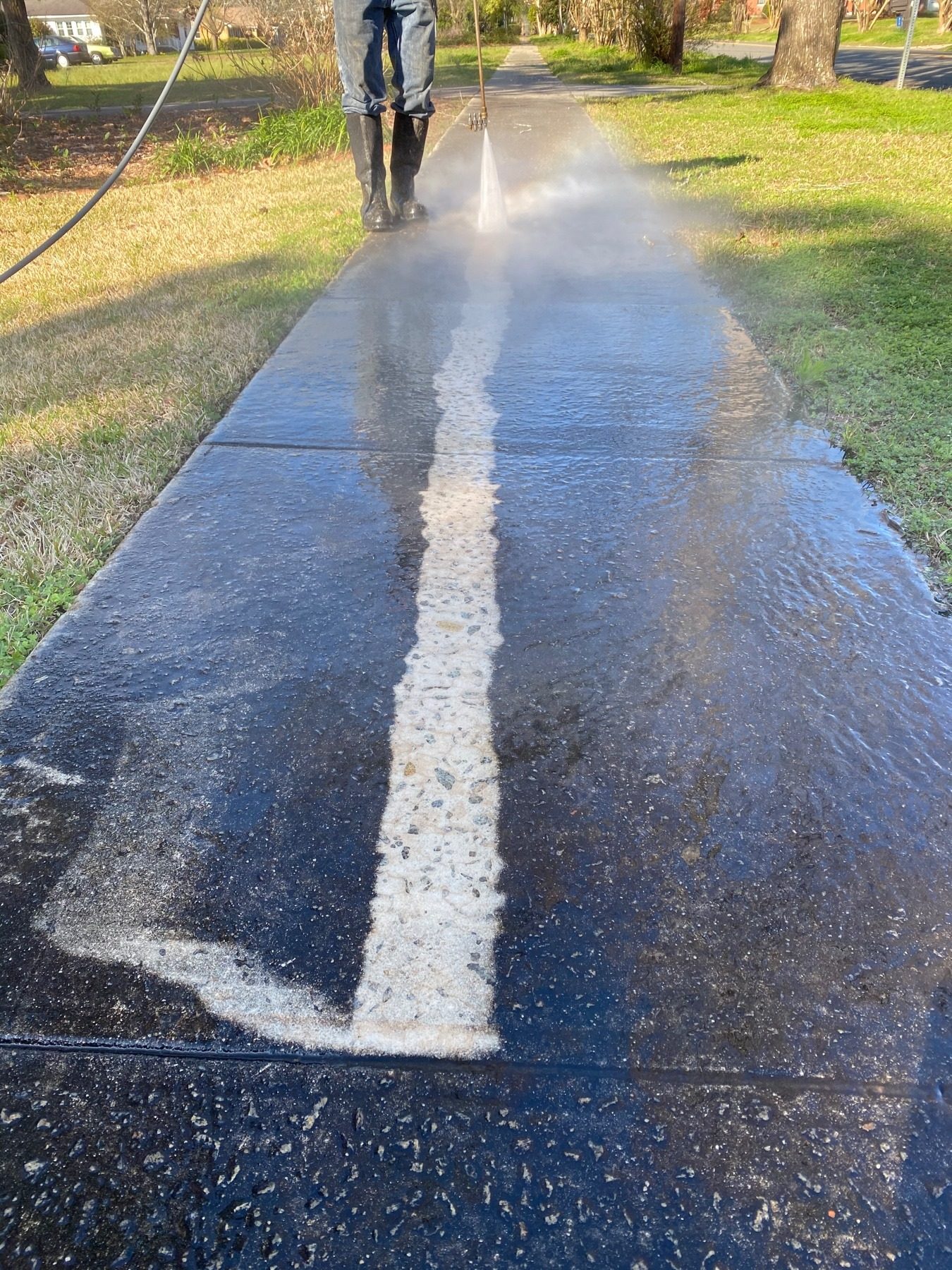 Driveway surface cleaning in progress Macon GA